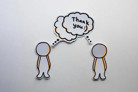 Paper figures with speech bubbles on the white Stock Photos