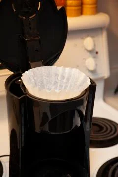 Paper filter in a coffee pot Stock Photos