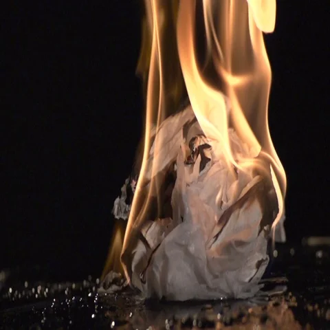 Paper on Fire in Slow Motion Stock Footage 69696553