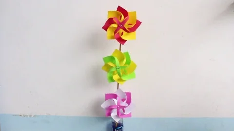 Paper flowers and wind Stock Footage 72975375