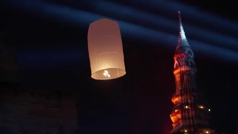 Paper flying lantern lights with flame floating lamps in night sky, Sky lantern Stock Footage 319332262