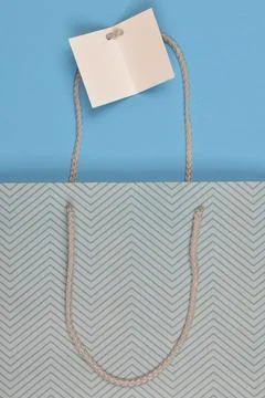 Paper Gift Bag with Chevron Pattern and Label Foto stock