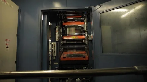Paper Going Through Machine Through Doorway Stock Footage 113016787