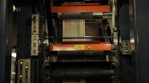 Paper Going Through Paper Machine Video stock 113016832
