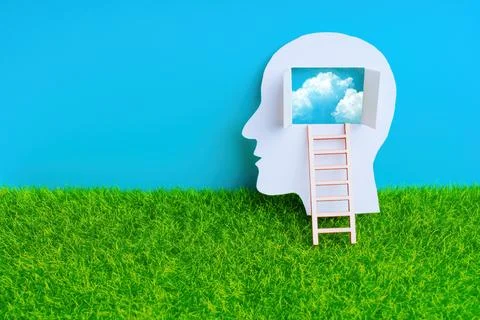 Paper Head with Open Window and Ladder on Grass and Sky Backdrop Stock Photos