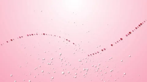 Paper heart shapes hang on strings flying on pink background. Symbols of love Stock Footage 243844387