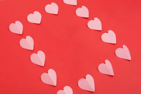 Paper hearts frame on red background Stock Photos