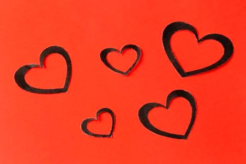 Paper hearts on a red background. Valentine's Day. Valentines day greeting ca Stock Photos