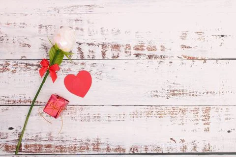 Paper hearts with red boxes and roses Stock Photos