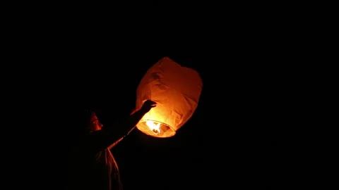 Paper Lantern Released into Air Stock Footage 253280143