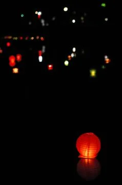 Paper lantern in water Stock Photos