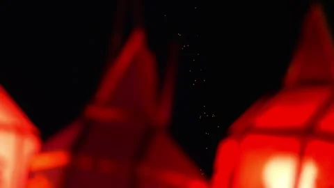Paper Lanterns Rising Behind Red Hanging Lanterns Stock Footage 324451060