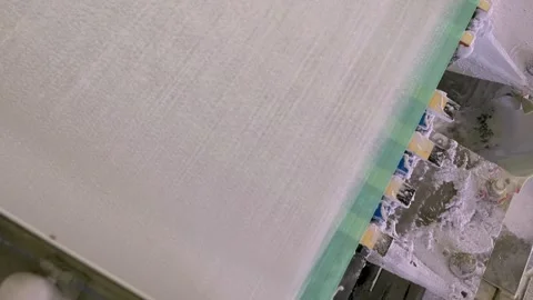 A paper machine for the production of white paper. Shafts with paper pulp Video stock 301445901