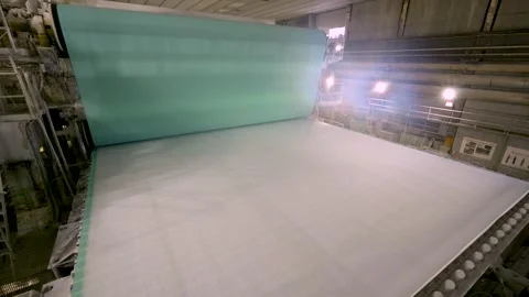 A paper machine for the production of white paper. Shafts with paper pulp Video stock 301450174