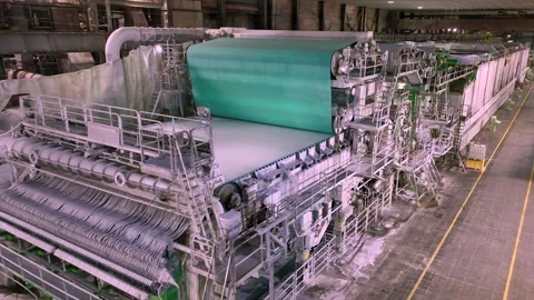 A paper machine for the production of white paper. Shafts with paper pulp Video stock 301456643