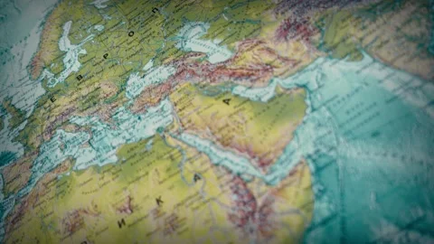 Paper map of the world. camera fly over paper world map marked with places of Stock-Footage 133162293