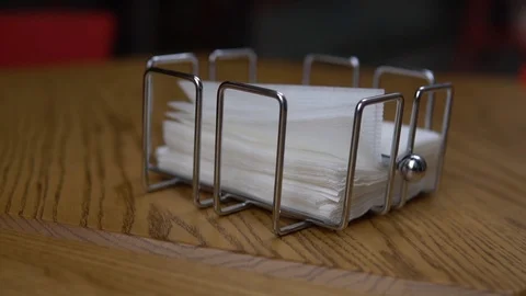 Paper napkins on a table in a restaurant Stock Footage 92268978