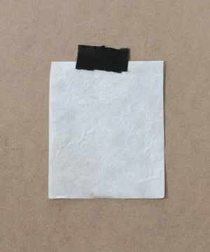 Paper note is empty space on brown wooden for design background. Stock Photos