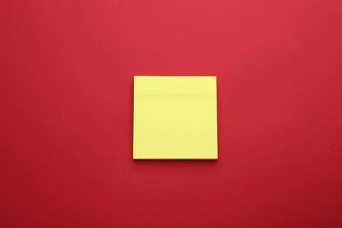 Paper note on red background, top view Stock Photos