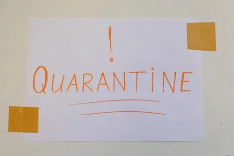 Paper note warning about quarantine Stock Photos
