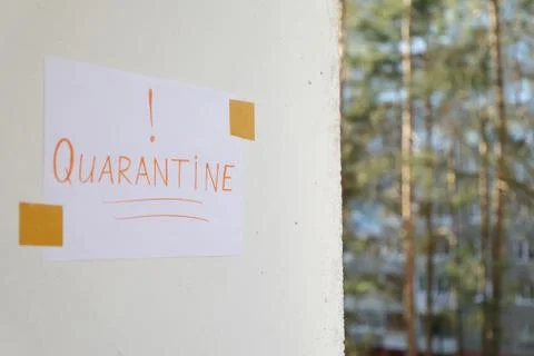 Paper note warning about quarantine Stock Photos