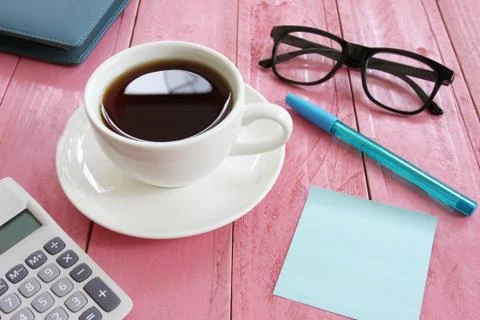 Paper note on the wooden work table. Stock Photos