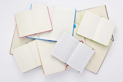Paper notebook at white background Stock Photos