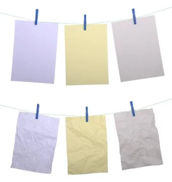 Paper notes hanging on wire Stock Photos