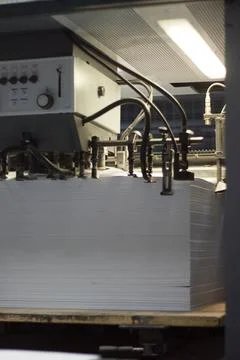 Paper in an offset printing machine Stock Photos