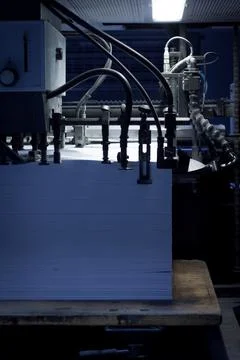 Paper in an offset printing machine Stock Photos