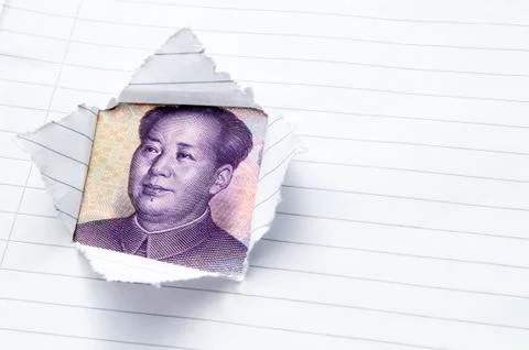Paper page torn with window opening showing Chinese currency Stock Photos
