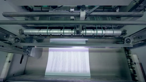 Paper piling on a conveyor, top view. Stock Footage 104225246