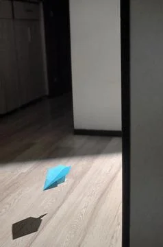 Paper plane and Shadow Fly inside of House Stock Photos