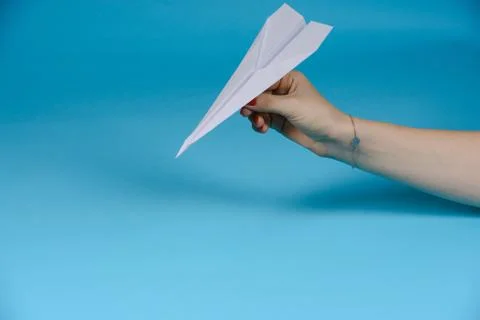 Paper plane, blue background 스톡 사진