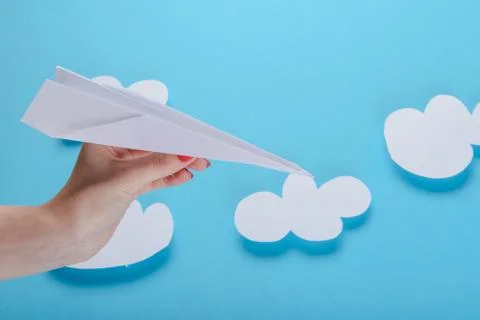 Paper plane, blue background Stock Photos