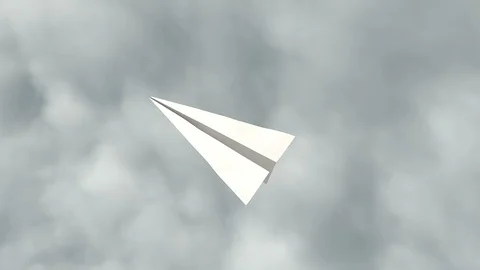 Paper plane flying high in the clouds Stock Footage 104532072