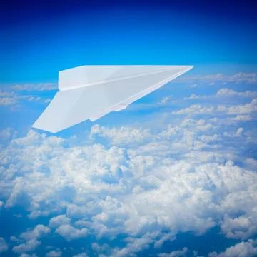 Paper plane flying Stock Photos