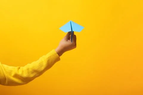Paper plane in hand Stock Photos