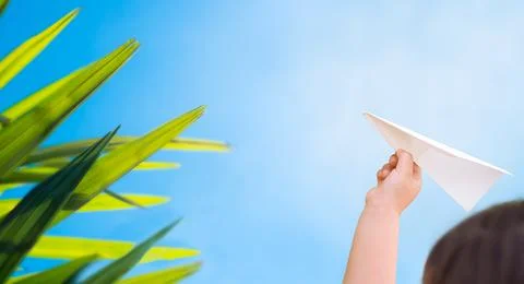 Paper plane on hand Stock Photos