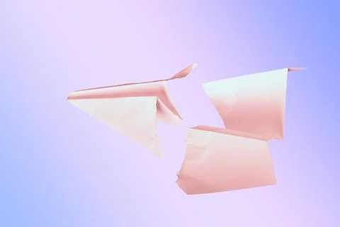 Paper plane in the middle it is torn. concept of breakdown, accident, crash.. Stock Photos