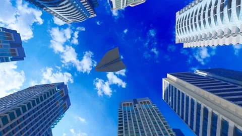 Paper planes flew over tall buildings and grass Stock Footage 170589224