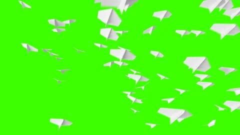 Paper Planes Fly to the Camera on a Green Background Stock-Footage 132521451