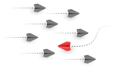 Paper planes flying in one direction with one red plane moving opposite, in.. Stock Illustration