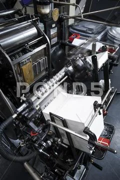 Paper Printing Machine At Work In Print Workshop