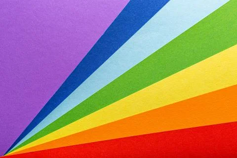 Paper rainbow colored rays stripes background Stock Photos