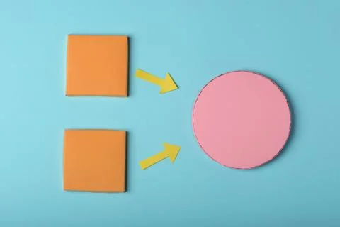 Paper rectangles, arrows and circle. Colorful folding art Stock Photos