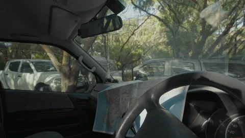 Paper road map at the helm of camper van. Video stock 301671402