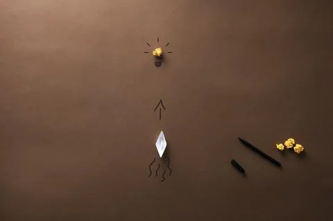 Paper rocket launching into creativity Stock Photos
