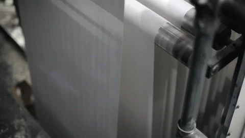 Paper Roll Rolling on Rollers in Printing Press Machine Closeup Detail Stock Footage 134458277