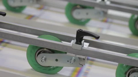 Paper rolling thru a machine - Close Up 스톡 동영상 40015102